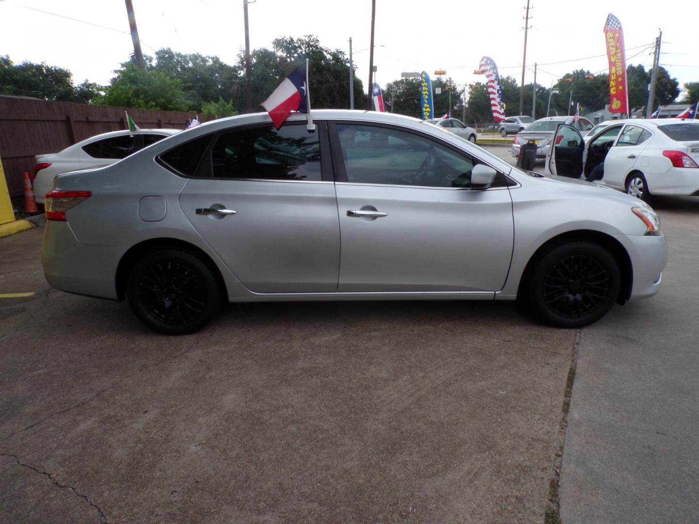 2014 /BLACK Nissan Sentra S 6MT (3N1AB7AP9EY) with an 1.8L L4 SFI DOHC 16V engine, 6-Speed Manual transmission, located at 16710 Clay Rd., Houston, TX, 77084, (281) 859-7900, 29.834864, -95.656166 - Photo#1